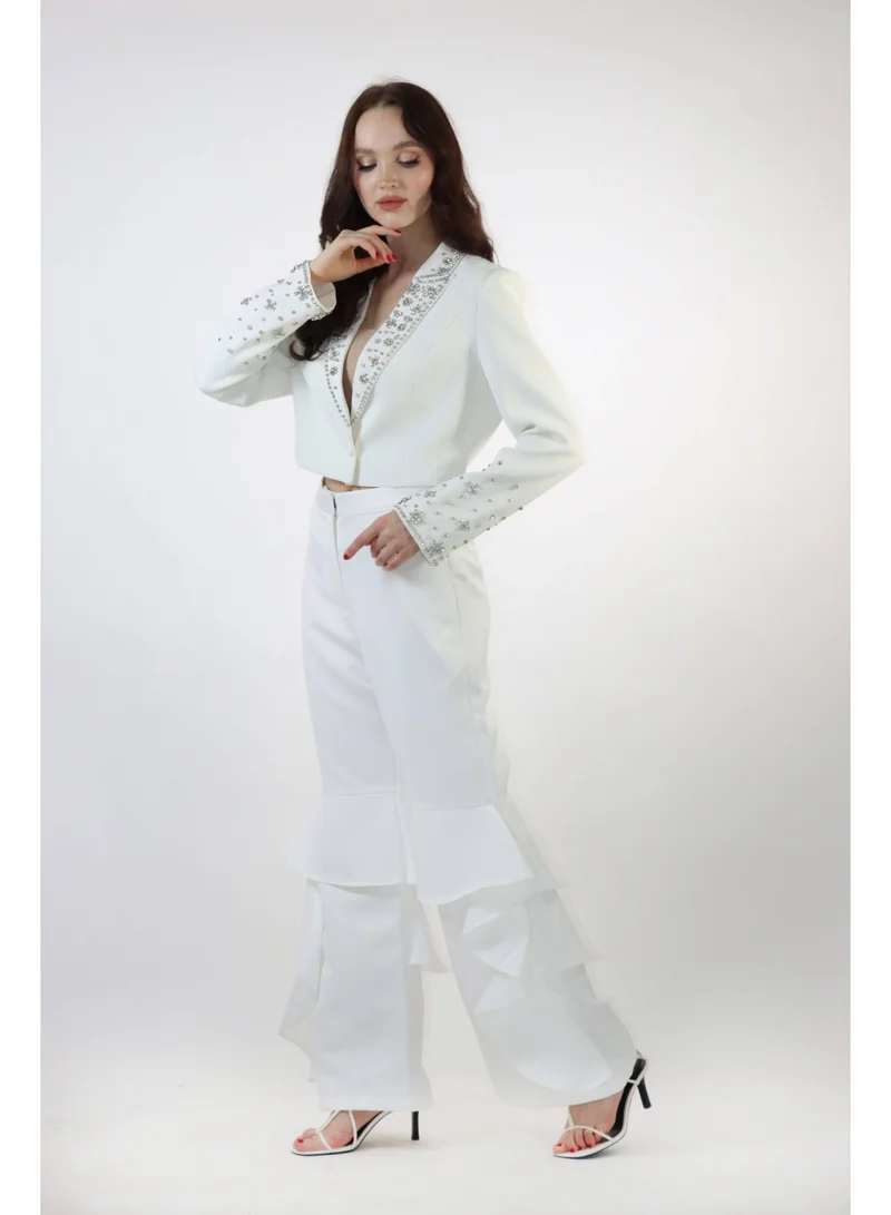 توترندس بنطلون أبيض بحركة تحتية